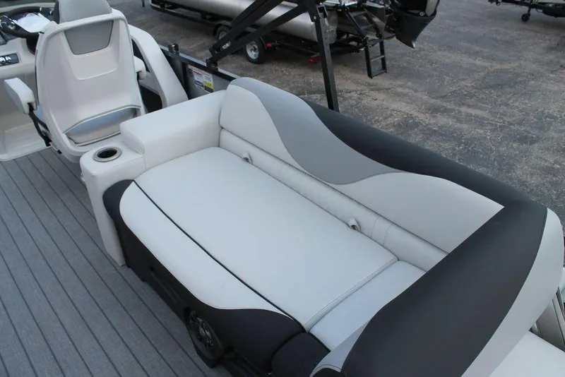 Slide: The Image of 2026 Avalon LSZ Quad Lounger Shift boat interior with sleek seating and modern design. - 11