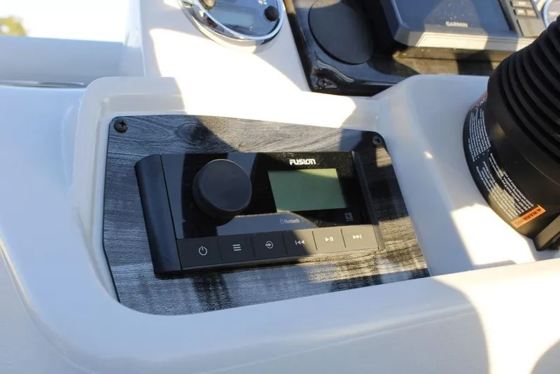 Slide: The Image of 2026 Avalon VLS QUAD LOUNGER 21 dashboard with Fusion audio system. - 24