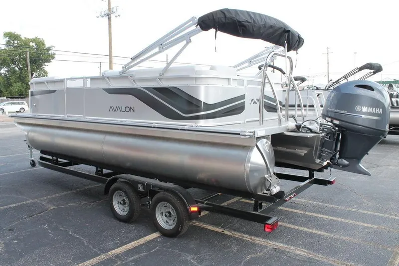 Slide: The Image of 2026 Avalon VLS QUAD LOUNGER 21 pontoon boat on trailer, underside view. - 9