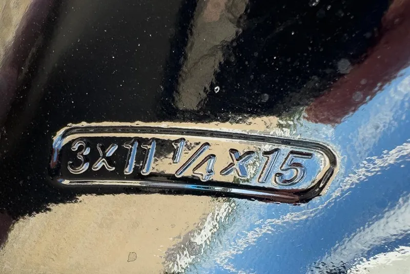 Slide: The Image of Close-up of Coastal Skiff 171 propeller with "3x11¼x15" marking, 2026 model. - 14