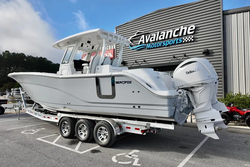 Slide: The Image of 2026 Sea Fox 328 Commander boat on trailer at Avalanche Motorsports. - 1