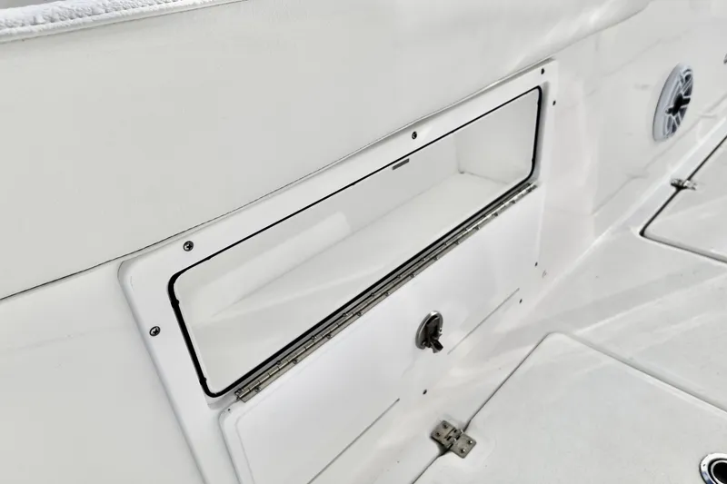 Slide: The Image of Storage compartment on a 2026 Sea Fox 328 Commander boat interior. - 11