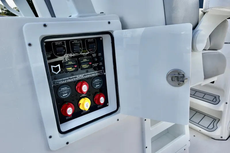 Slide: The Image of Electrical panel on a 2026 Sea Fox 328 Commander boat, featuring labeled switches and controls. - 14