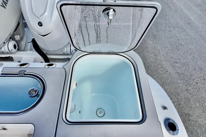 Slide: The Image of Open storage compartment on 2026 Sea Fox 328 Commander boat, showcasing interior space. - 19