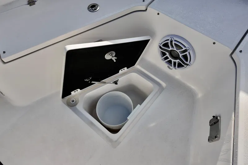 Slide: The Image of 2026 Sea Fox 328 Commander boat storage compartment with speaker and bucket. - 30