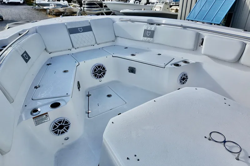 Slide: The Image of Interior of 2026 Sea Fox 328 Commander boat, featuring spacious seating and modern design. - 33