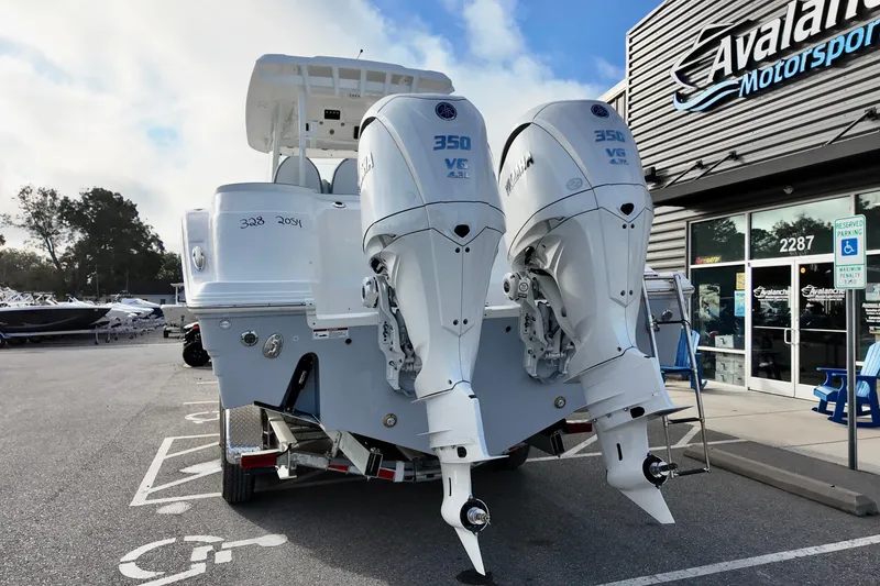 Slide: The Image of 2026 Sea Fox 328 Commander with twin Yamaha 350 engines at dealership. - 35