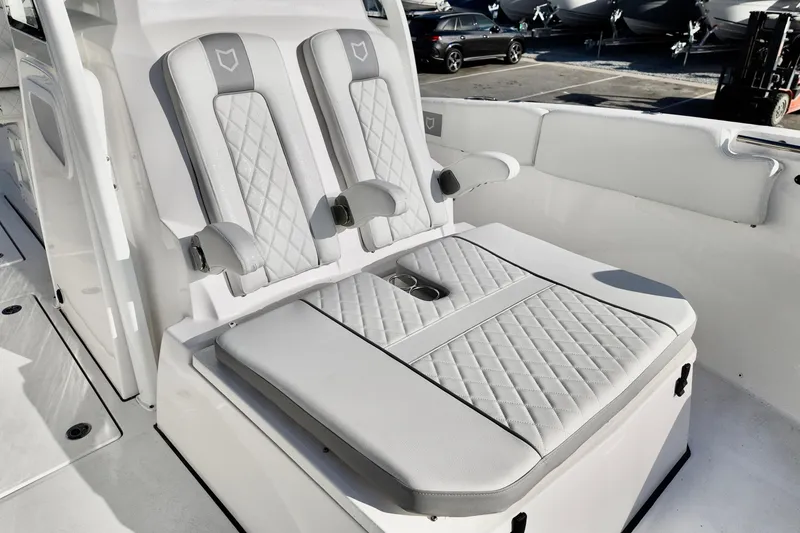 Slide: The Image of Luxury seating on 2026 Sea Fox 328 Commander boat with quilted upholstery. - 6