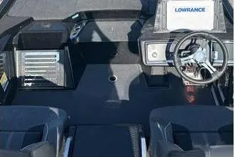 Slide: The Image of 2024 Ranger Z520R boat cockpit with steering wheel and Lowrance electronics. - 5