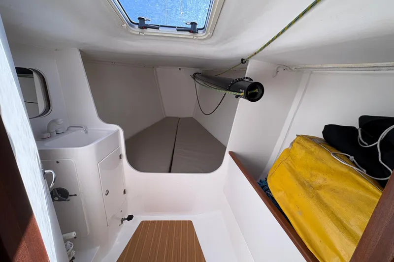 Slide: The Image of Interior cabin of 2014 J Boats J/111 sailboat with compact sleeping area. - 23