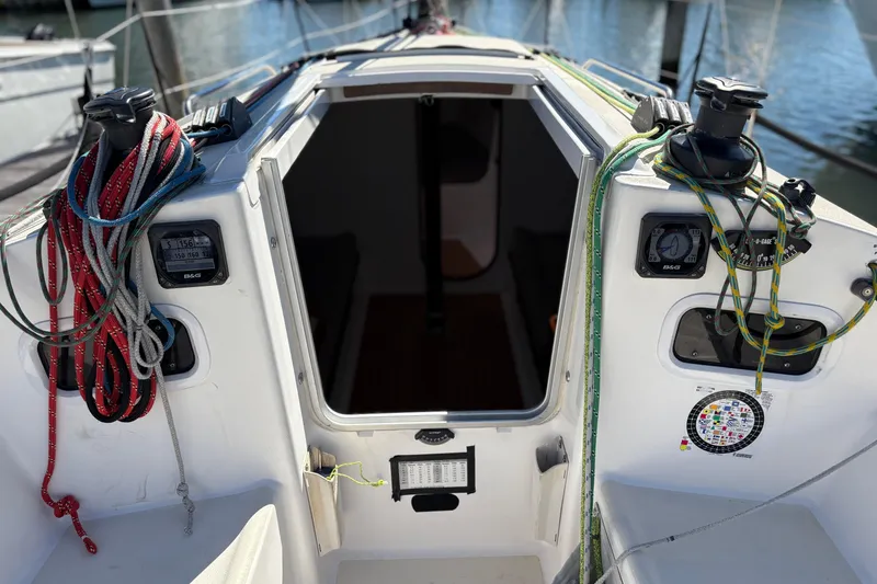 Slide: The Image of 2014 J Boats J/111 cockpit with ropes and navigation instruments. - 9