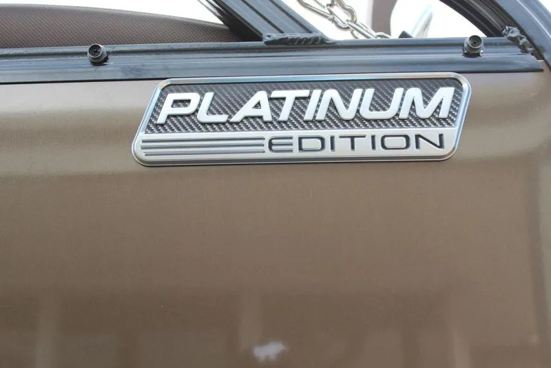 Slide: The Image of Platinum Edition badge on 2026 Avalon LSZ Cruise Rear Bench 21 boat. - 16