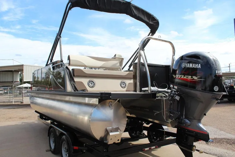 Slide: The Image of 2026 Avalon LSZ Cruise Rear Bench 21 pontoon boat with Yamaha VMAX engine on trailer. - 5