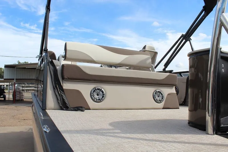 Slide: The Image of 2026 Avalon LSZ Cruise Rear Bench 21 with stylish seating and speakers, under a clear blue sky. - 8