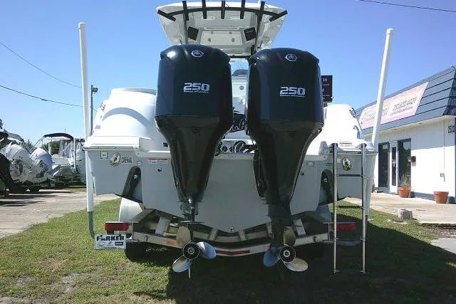 Slide: The Image of 2021 Sea Fox 288 Commander boat with dual 250 horsepower engines, rear view. - 12