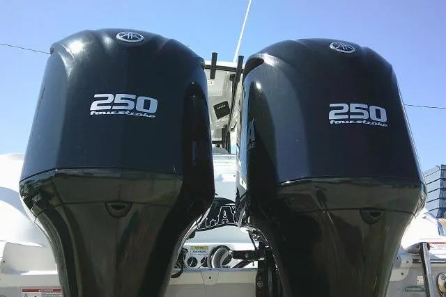 Slide: The Image of Twin 250 horsepower outboard engines on a 2021 Sea Fox 288 Commander boat. - 13