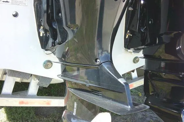 Slide: The Image of 2021 Sea Fox 288 Commander boat engines on trailer, close-up view. - 15