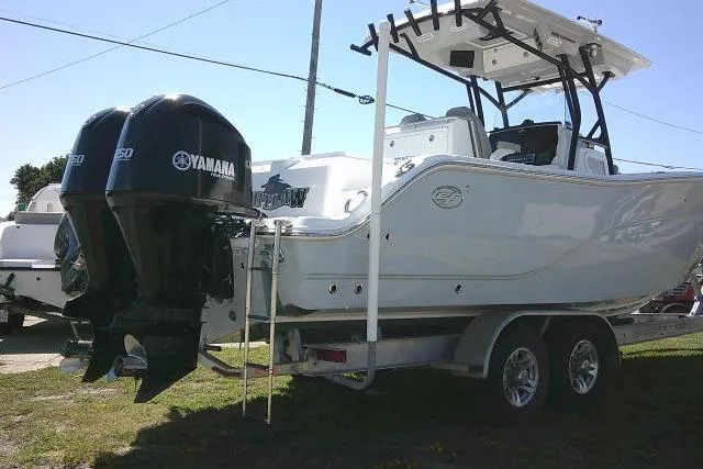 Slide: The Image of 2021 Sea Fox 288 Commander boat with dual Yamaha engines on a trailer. - 16
