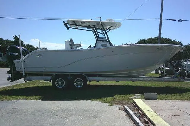 Slide: The Image of 2021 Sea Fox 288 Commander boat on trailer, side view, outdoors. - 17