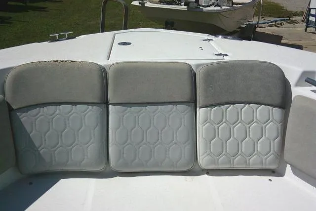 Slide: The Image of 2021 Sea Fox 288 Commander boat seating with hexagonal pattern upholstery. - 21