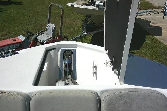 Slide: The Image of 2021 Sea Fox 288 Commander boat anchor compartment with open hatch, showing interior details. - 22
