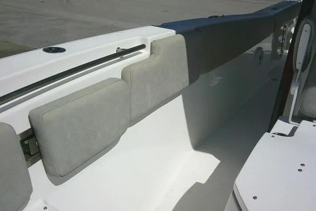 Slide: The Image of 2021 Sea Fox 288 Commander boat interior with cushioned seating and sleek design. - 28