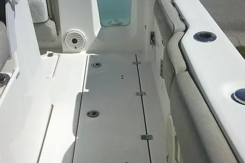 Slide: The Image of 2021 Sea Fox 288 Commander boat interior with seating and storage compartments. - 33