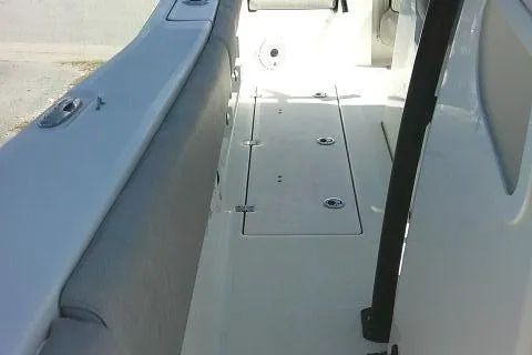 Slide: The Image of 2021 Sea Fox 288 Commander boat interior, featuring spacious deck and seating area. - 37