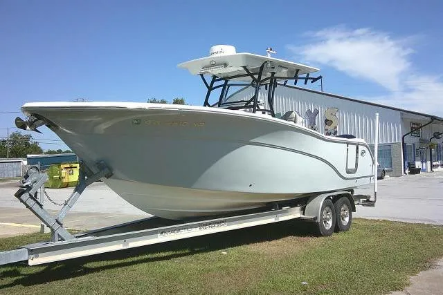 Slide: The Image of 2021 Sea Fox 288 Commander boat on trailer outside a building. - 4