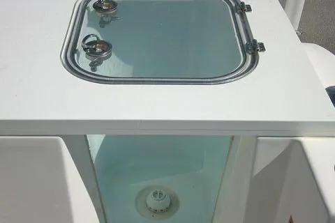 Slide: The Image of Livewell on 2021 Sea Fox 288 Commander boat with glass lid and secure latches. - 47