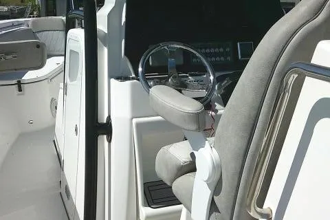 Slide: The Image of 2021 Sea Fox 288 Commander boat interior with steering wheel and seating. - 51