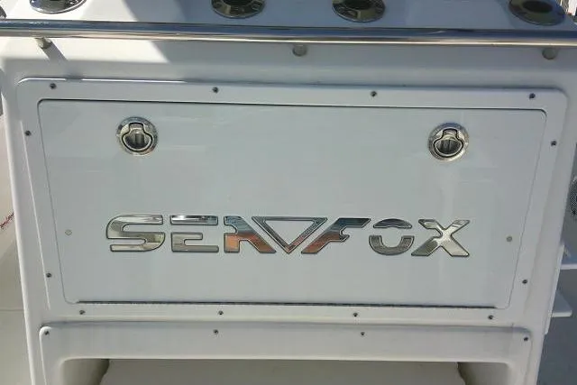 Slide: The Image of 2021 Sea Fox 288 Commander boat console with logo and stainless steel fittings. - 53
