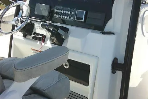 Slide: The Image of 2021 Sea Fox 288 Commander boat console with steering wheel and controls. - 58