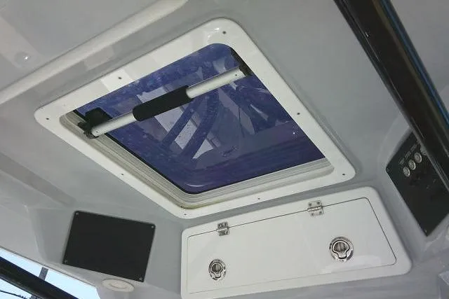 Slide: The Image of 2021 Sea Fox 288 Commander boat interior with hatch and storage compartments. - 59
