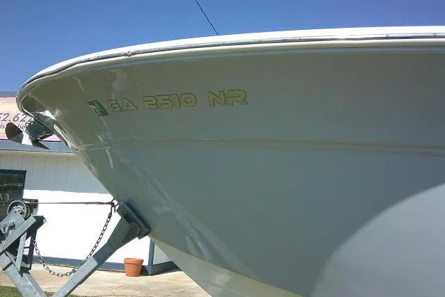Slide: The Image of 2021 Sea Fox 288 Commander boat on trailer, side view with registration number. - 6