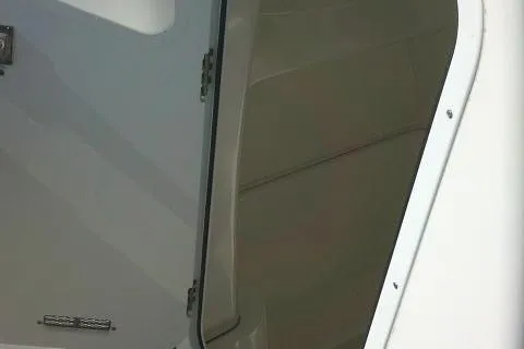 Slide: The Image of 2021 Sea Fox 288 Commander interior detail with open compartment door. - 62