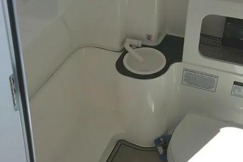 Slide: The Image of 2021 Sea Fox 288 Commander boat interior with compact bathroom amenities. - 63