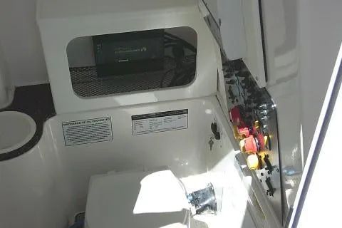 Slide: The Image of 2021 Sea Fox 288 Commander interior with control panel and storage area. - 64