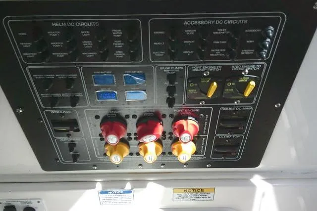 Slide: The Image of Control panel of a 2021 Sea Fox 288 Commander boat with various switches and dials. - 67