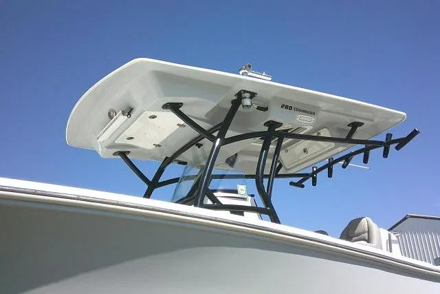 Slide: The Image of 2021 Sea Fox 288 Commander boat with T-top against clear blue sky. - 7