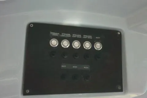Slide: The Image of Control panel of 2021 Sea Fox 288 Commander boat with labeled buttons. - 70
