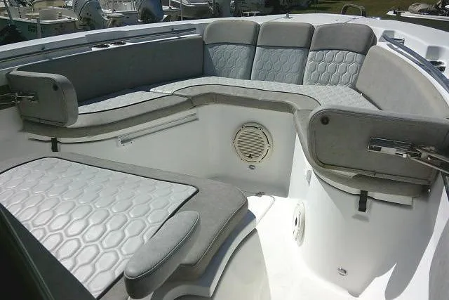 Slide: The Image of 2021 Sea Fox 288 Commander boat interior with cushioned seating and modern design. - 74