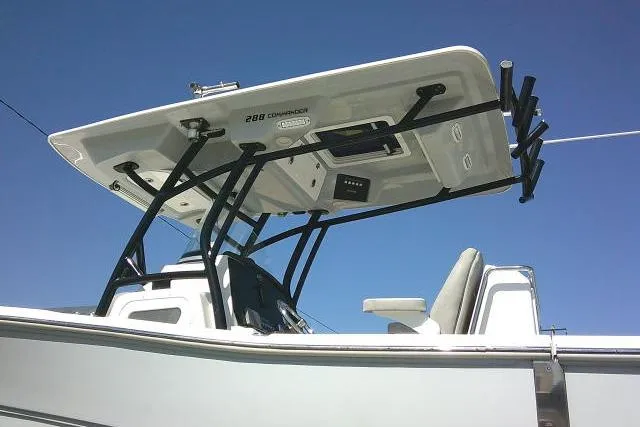 Slide: The Image of 2021 Sea Fox 288 Commander boat with T-top against clear blue sky. - 9