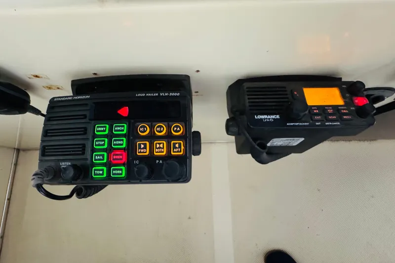 Slide: The Image of Control panel of a 1987 Tollycraft 40 Sport Sedan with communication devices. - 22