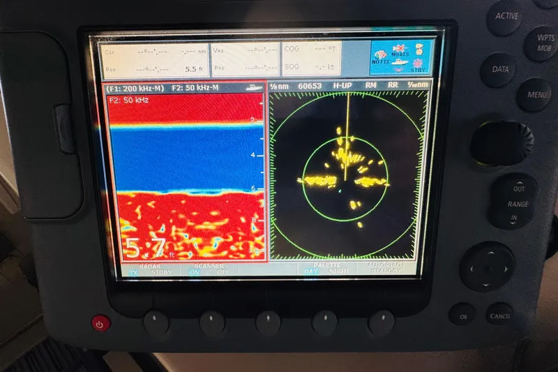Slide: The Image of Radar and sonar display on 1987 Tollycraft 40 Sport Sedan boat. - 24