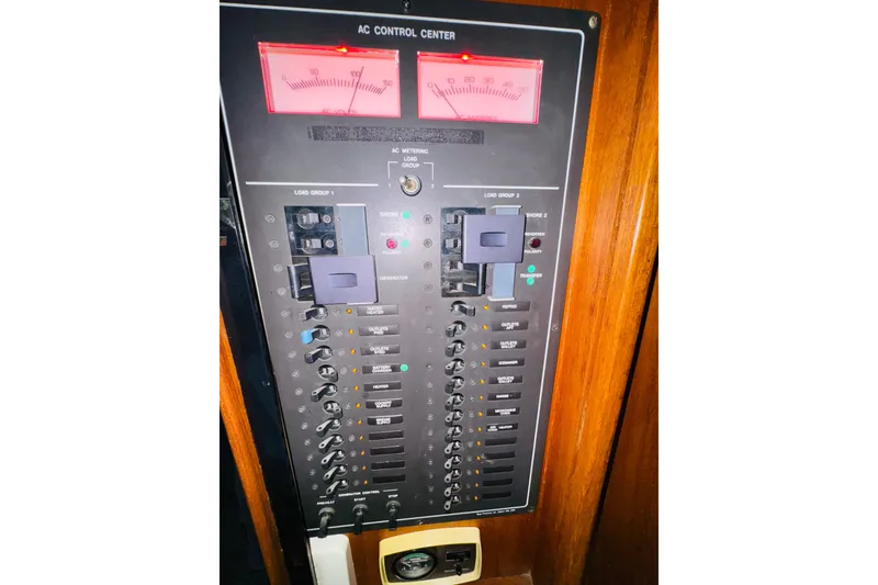 Slide: The Image of Electrical control panel on a 1987 Tollycraft 40 Sport Sedan boat. - 47