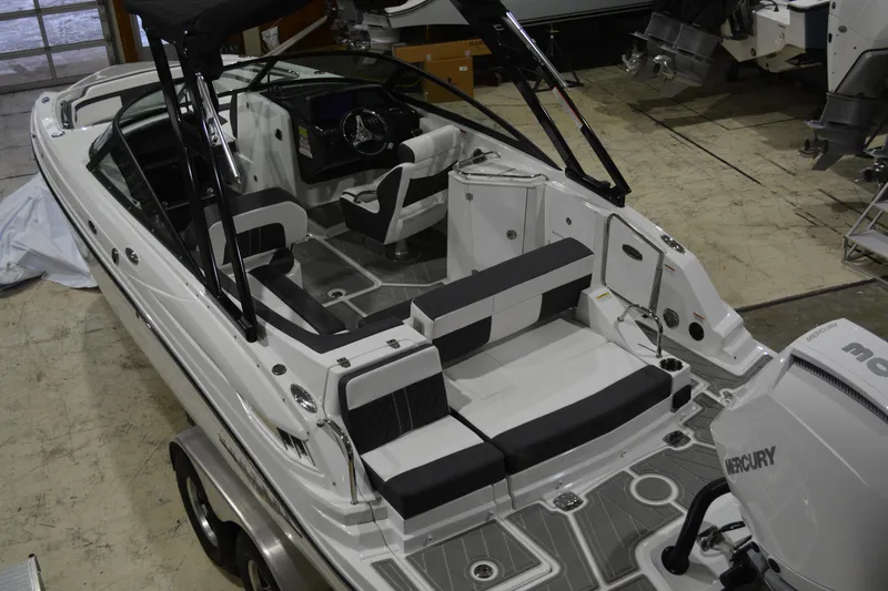 Slide: The Image of 2026 Monterey M-45 boat interior with sleek seating and modern design in a showroom. - 10