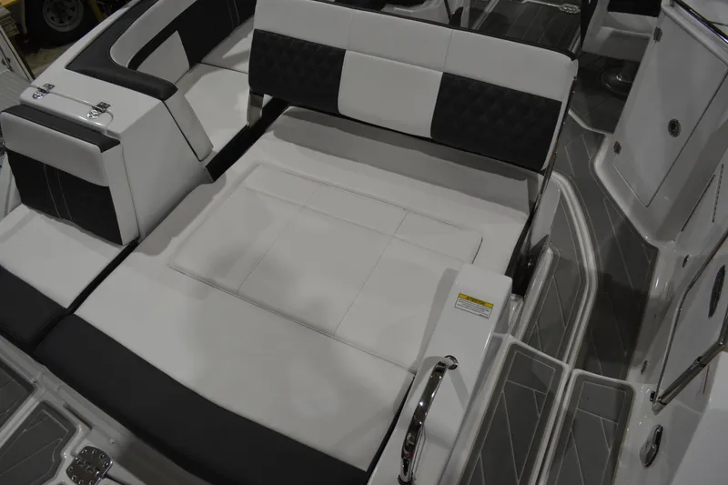 Slide: The Image of Luxury seating on 2026 Monterey M-45 boat, featuring sleek black and white upholstery. - 18