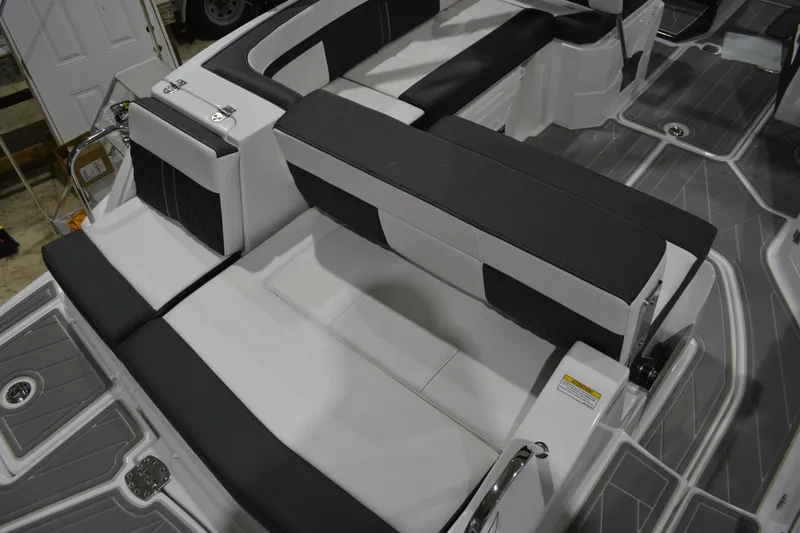 Slide: The Image of Luxury seating on 2026 Monterey M-45 boat, featuring sleek black and white upholstery. - 22