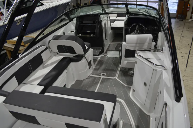 Slide: The Image of 2026 Monterey M-45 boat interior with sleek seating and modern design. - 23